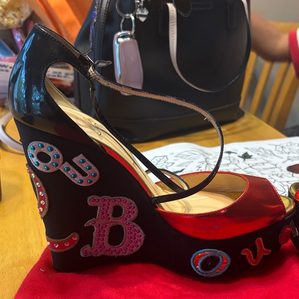 Christian Louboutin Vibrant Black and Red Wedges